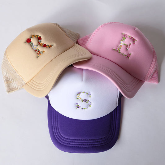 FLORAL MONO TRUCKER HAT