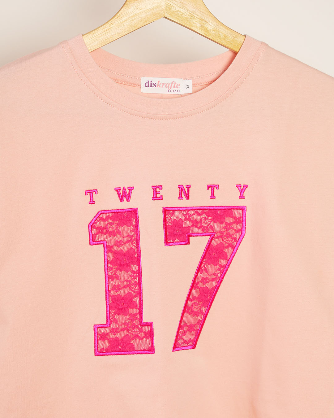 Peachy Pink drop shoulder with 'TWENTY 17' lace applique embroidery